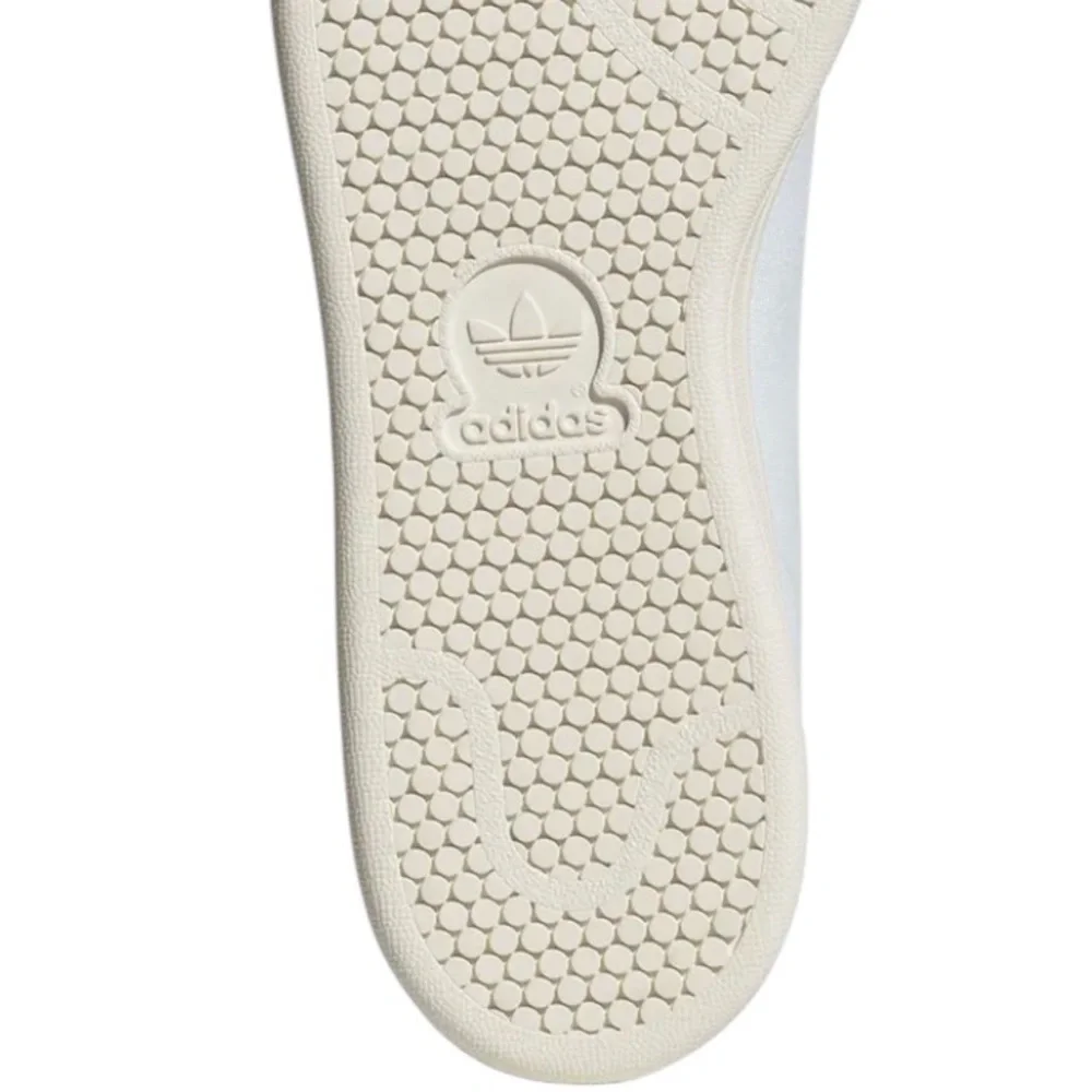 Sporty and Rich Adidas Stan Smith shoes